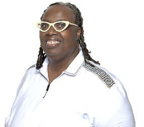 Simone Ranson smiles confidently, wearing stylish glasses and a white shirt with decorative details.