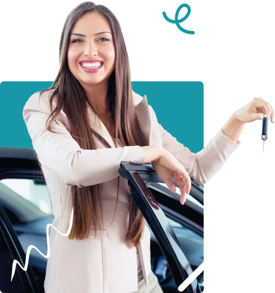 Smiling woman in a blazer stands by a car, holding keys and leaning on the door.