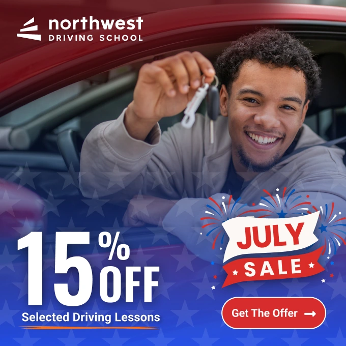 Smiling young man holding car keys in a vehicle, promoting a July sale for 15% off driving lessons.
